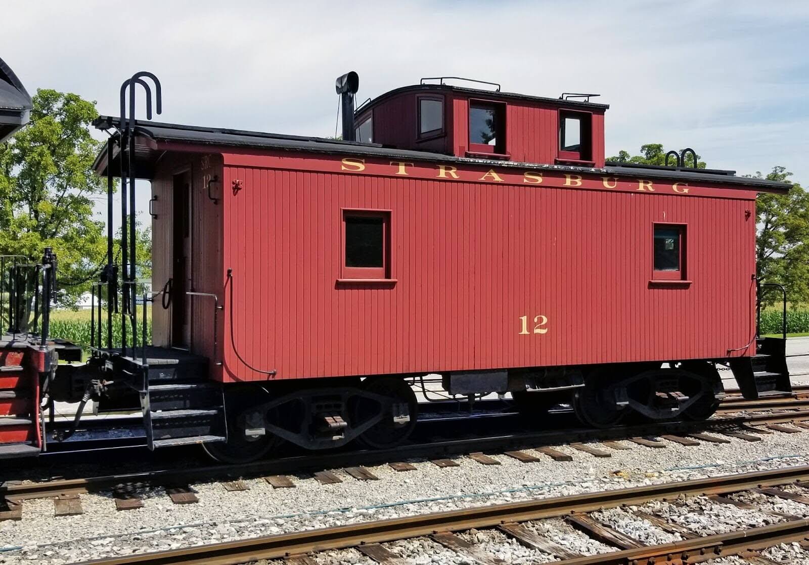 side angle of Strasburg Rail Road's cupola caboose car #12