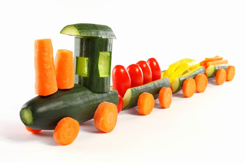 a combination of chopped vegetables arranged to look like a train