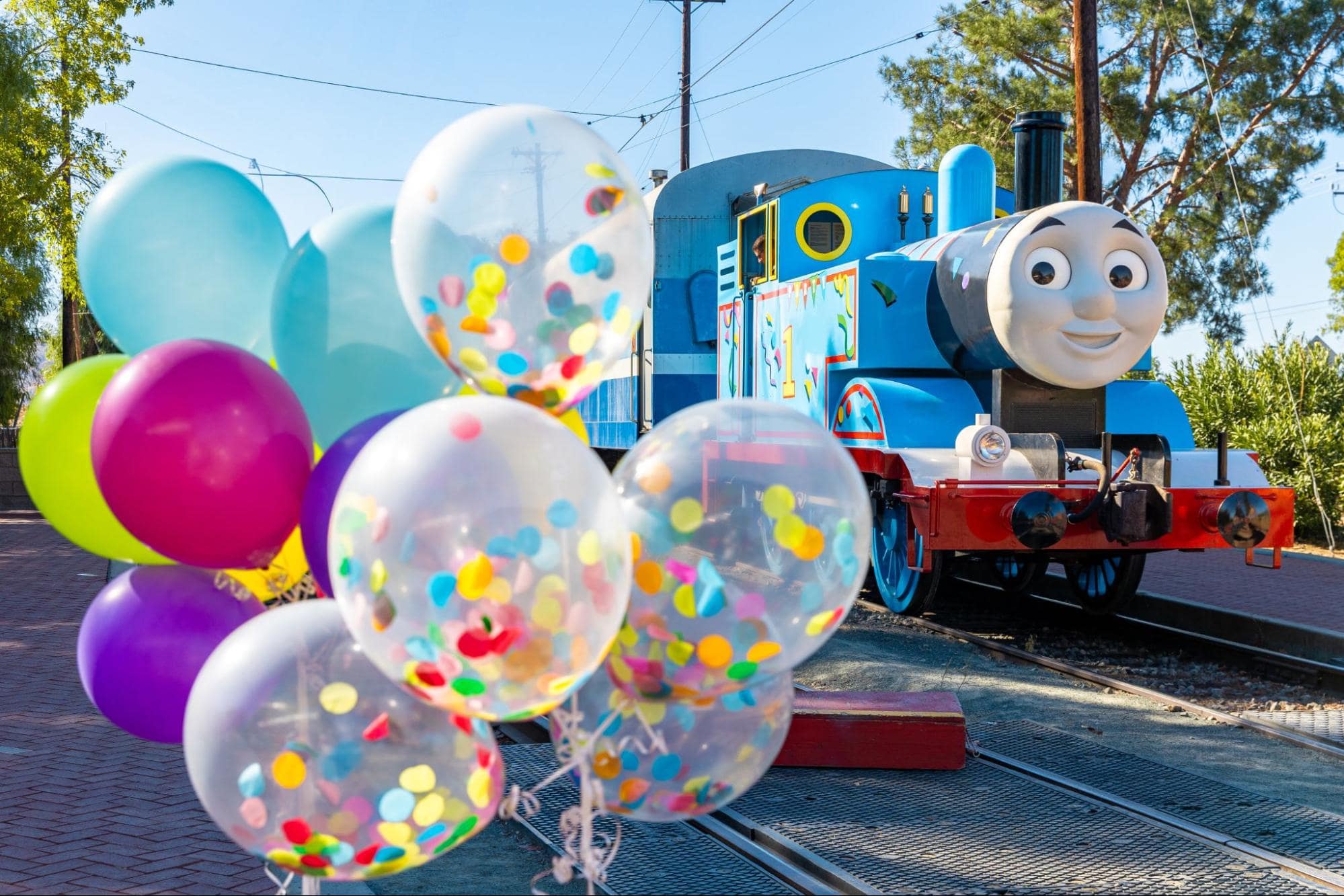Colorful balloons in front of Thomas the Tank Engine Movies at Strasburg Rail Road